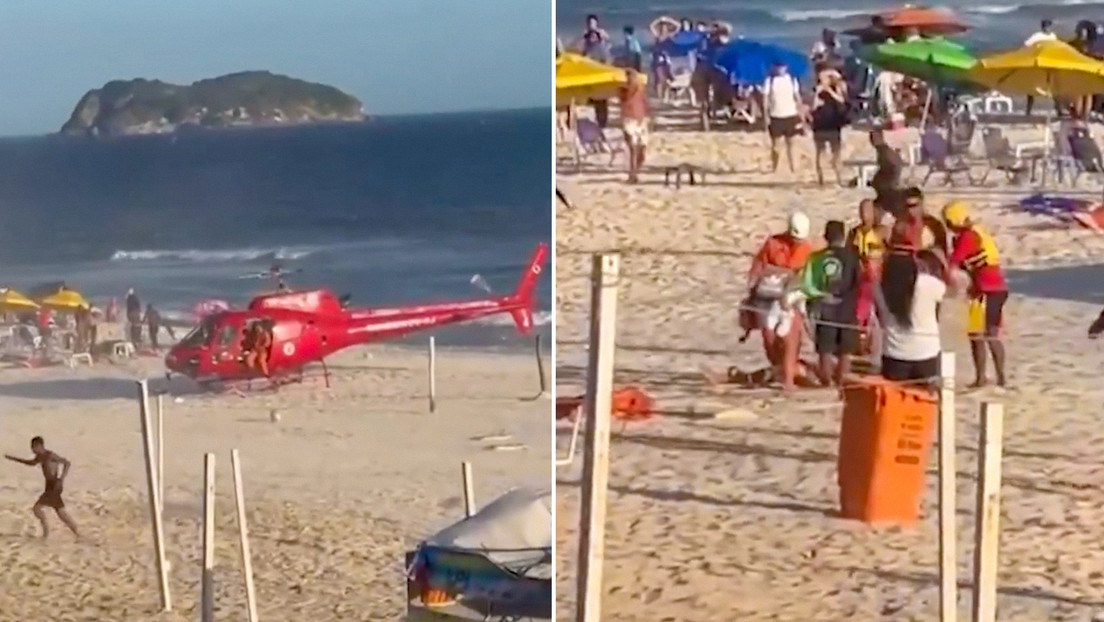 Momento en el que llega el helicóptero a la playa para rescatar a los dos hombres.